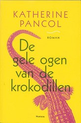 De gele ogen van de krokodillen